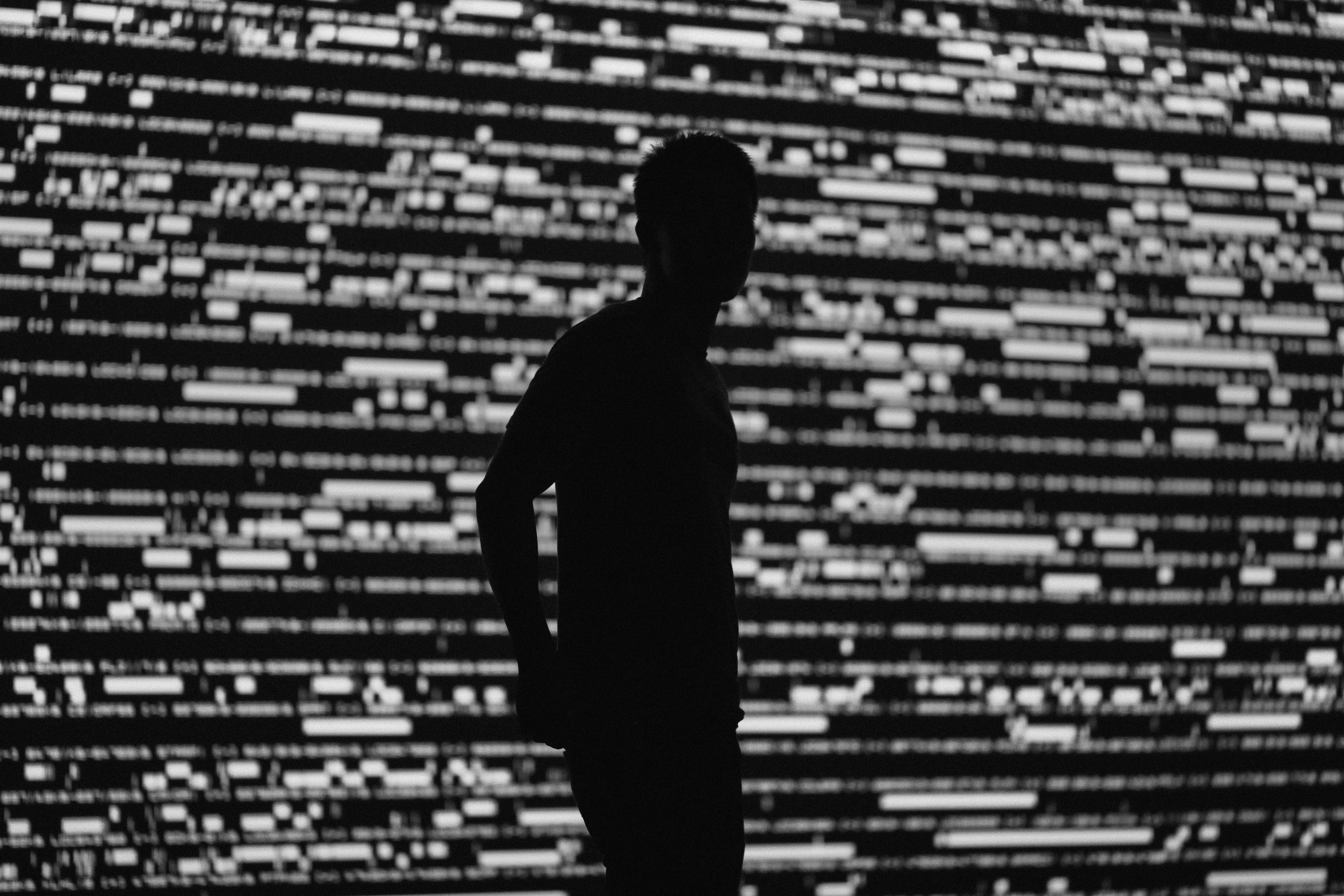 Man standing in front of screen